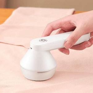 Fuzz-Away™ | ¡Elimina la pelusa más rebelde!