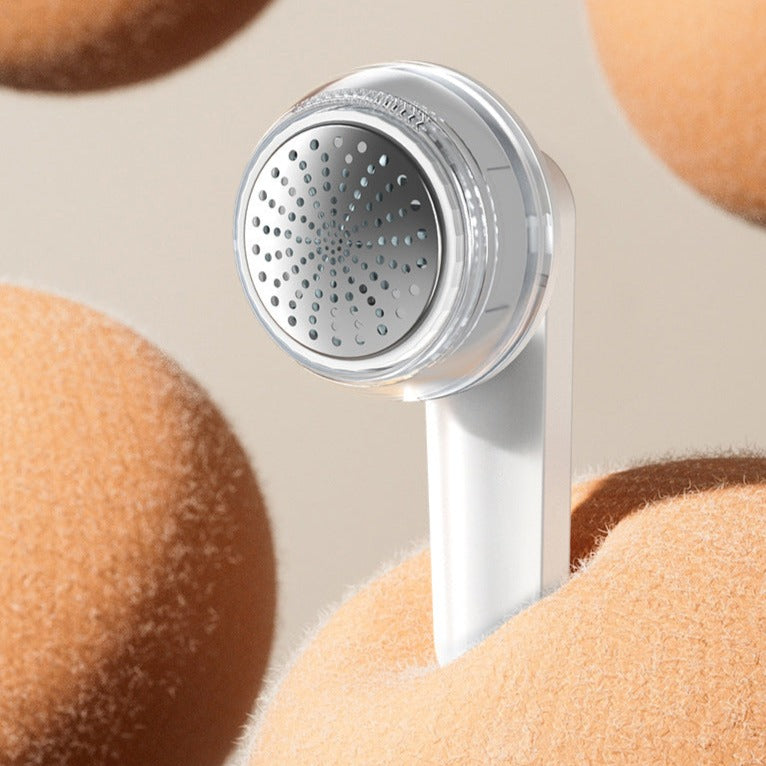 Fuzz-Away™ | ¡Elimina la pelusa más rebelde!